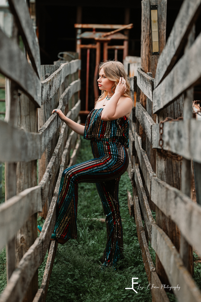 Laze L Farm Photography | Western Fashion Photoshoot | Taylorsville NC | standing by fence
