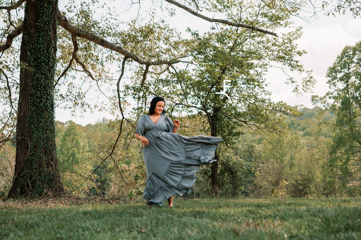 Laze L Farm Photography | Western Inspired Photoshoot | Taylorsville NC | twirling the dress around