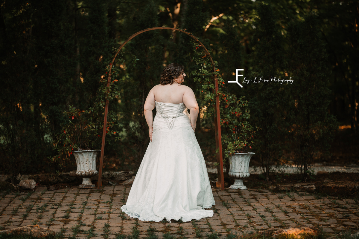 Laze L Farm Photography | Bridal Session | Amity Creek Farms - Dudley Shoals NC | showing the back of the wedding dress