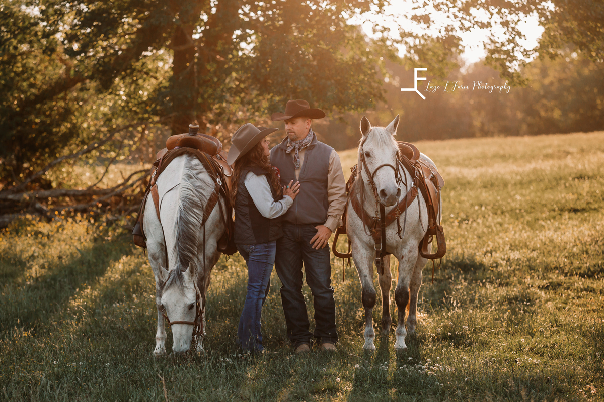 Laze L Farm Photography | Cowboy + Cowgirl Photoshoot | Dudley Shoals NC | couple standing next to their horses