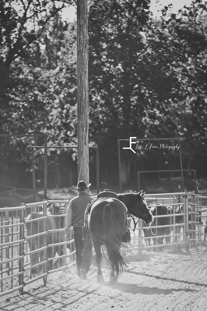 Laze L Farm Photography | Cowboy + Cowgirl Photoshoot | Dudley Shoals NC | black and white of cowboy walking horse