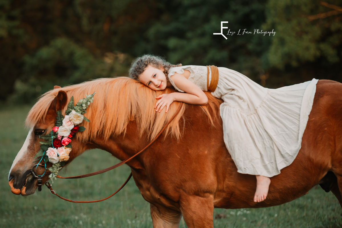 Laze L Farm Photography | Farm Session | Lincolnton NC | little girl leaning over horse's neck