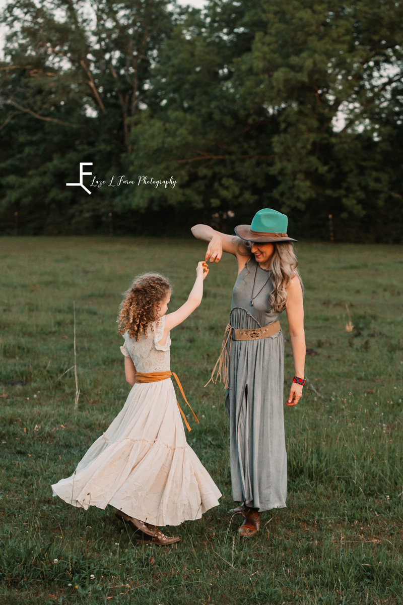 Laze L Farm Photography | Farm Session | Lincolnton NC | mom twirling daughter in dress