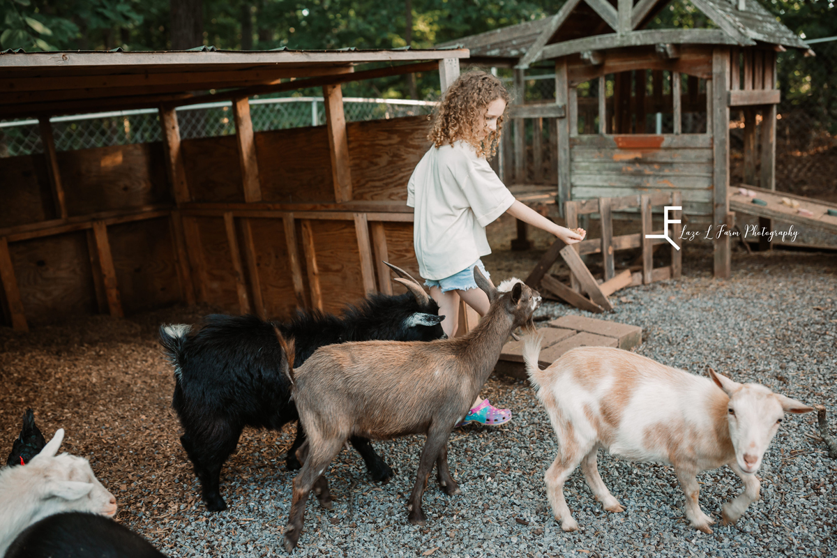 Laze L Farm Photography | Farm Session | Lincolnton NC | daughter feeding goats