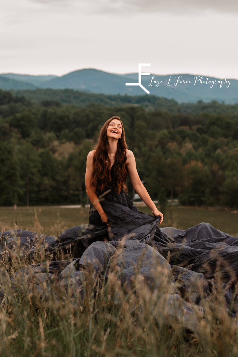 Laze L Farm Photography | Parachute Dress | Taylor Made Farms - Taylorsville NC | candid laughing while twirling parachute dress