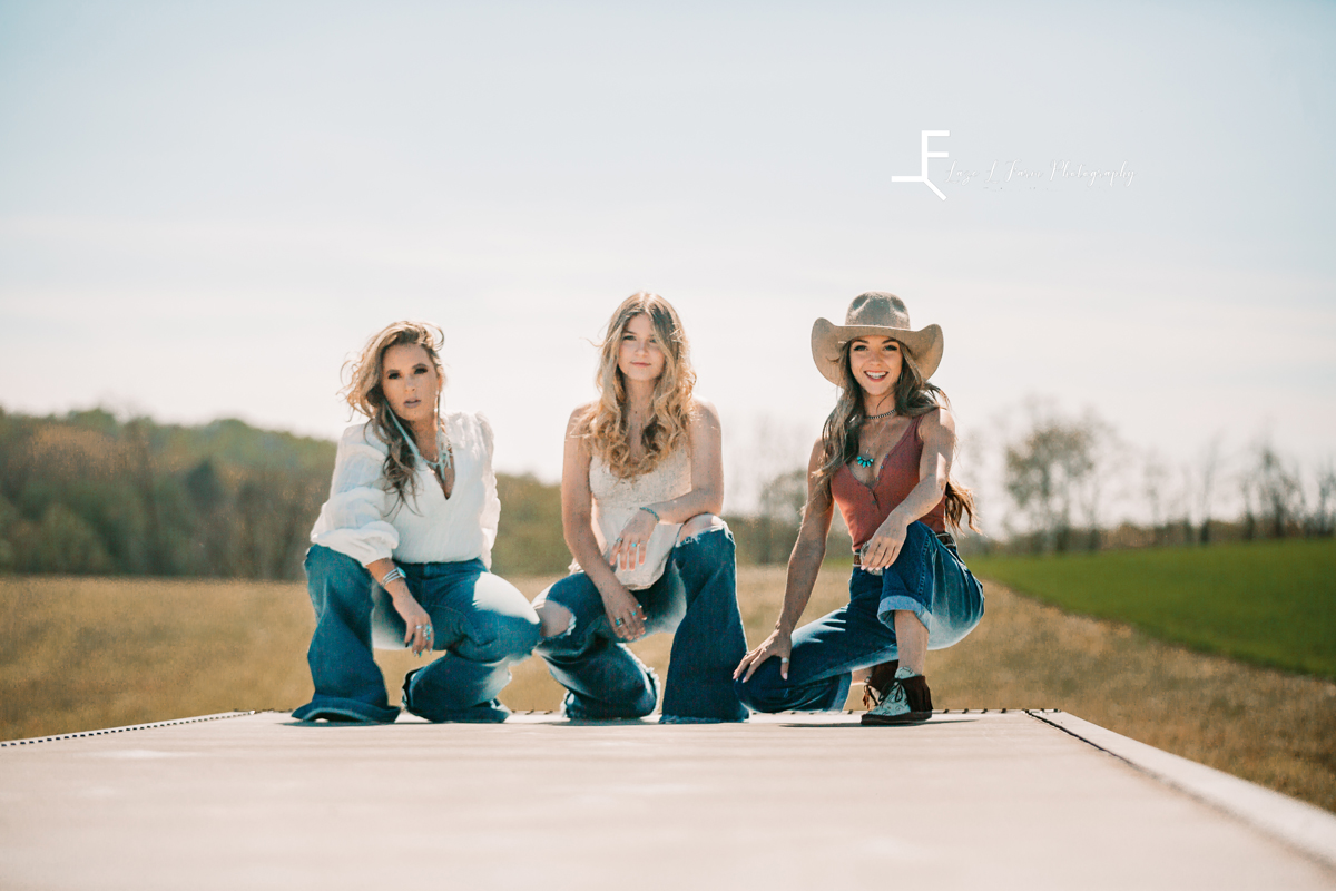 Laze L Farm Photography | Western Lifestyle Photoshoot | Wytheville Va | three girls posed on the road