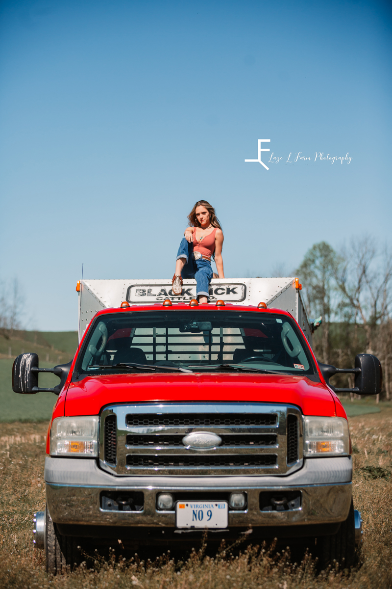 Laze L Farm Photography | Western Lifestyle Photoshoot | Wytheville Va | posed sitting on top of farm truck