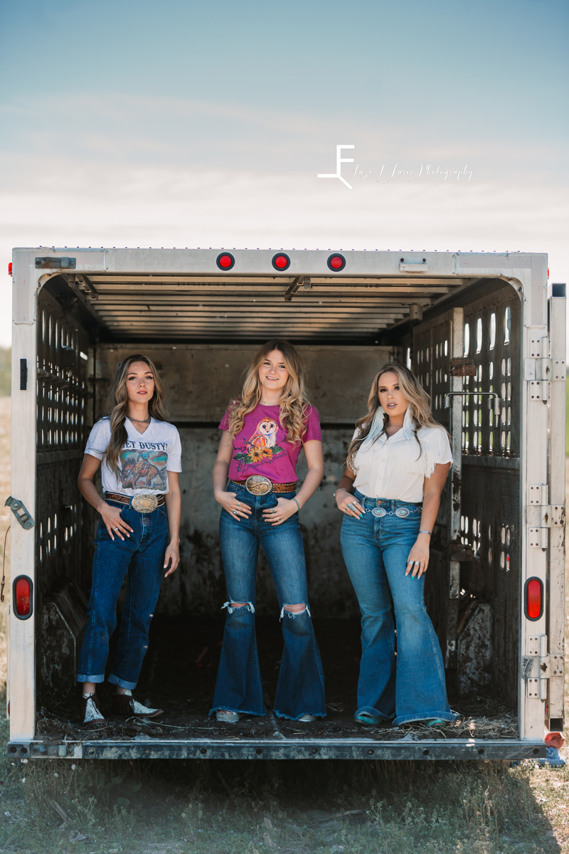 Laze L Farm Photography | Western Lifestyle Photoshoot | Wytheville Va | three girls standing in a trailer