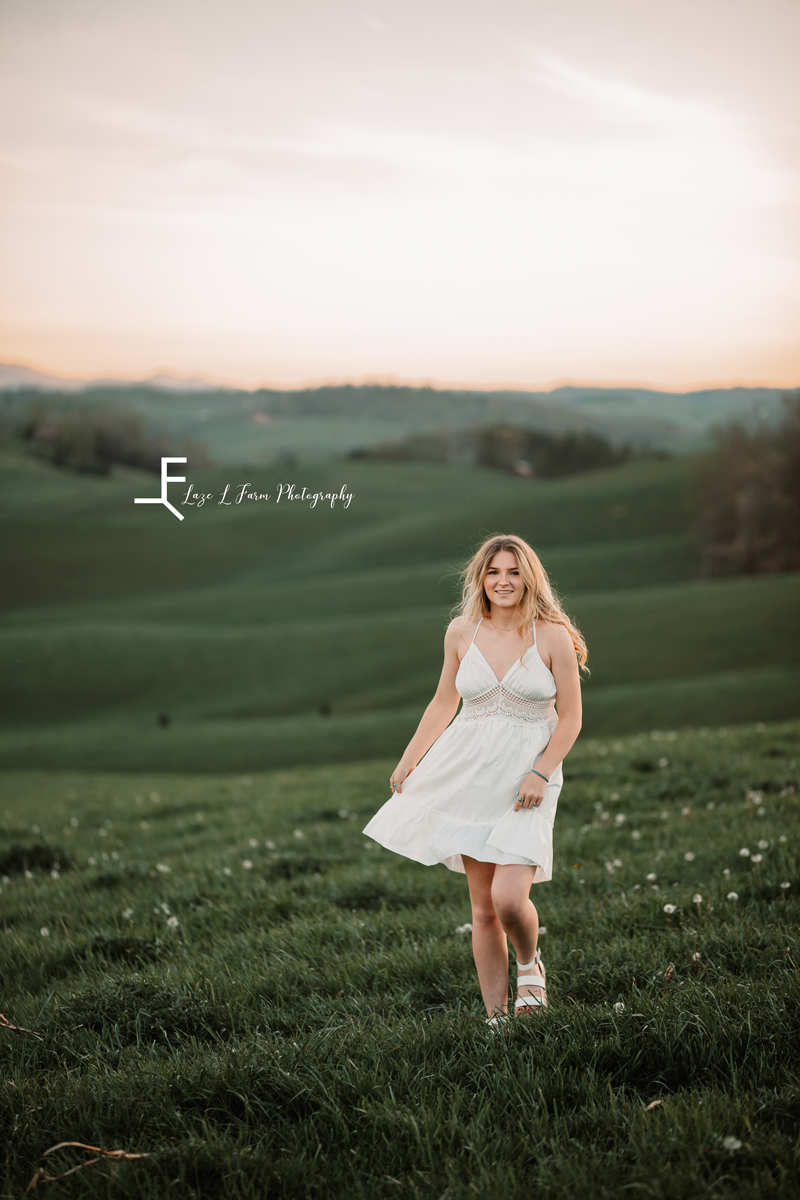 Laze L Farm Photography | Western Lifestyle Photoshoot | Wytheville Va | candid walking towards camera in a field