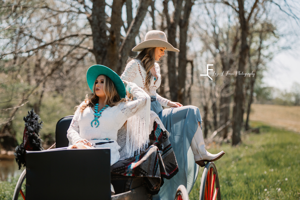 Laze L Farm Photography | Western Lifestyle Photoshoot | Wytheville Va | two girls posed sitting in a carriage