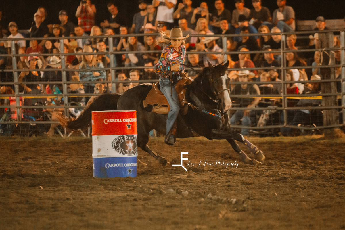 barrel racing with cowgirl turning right