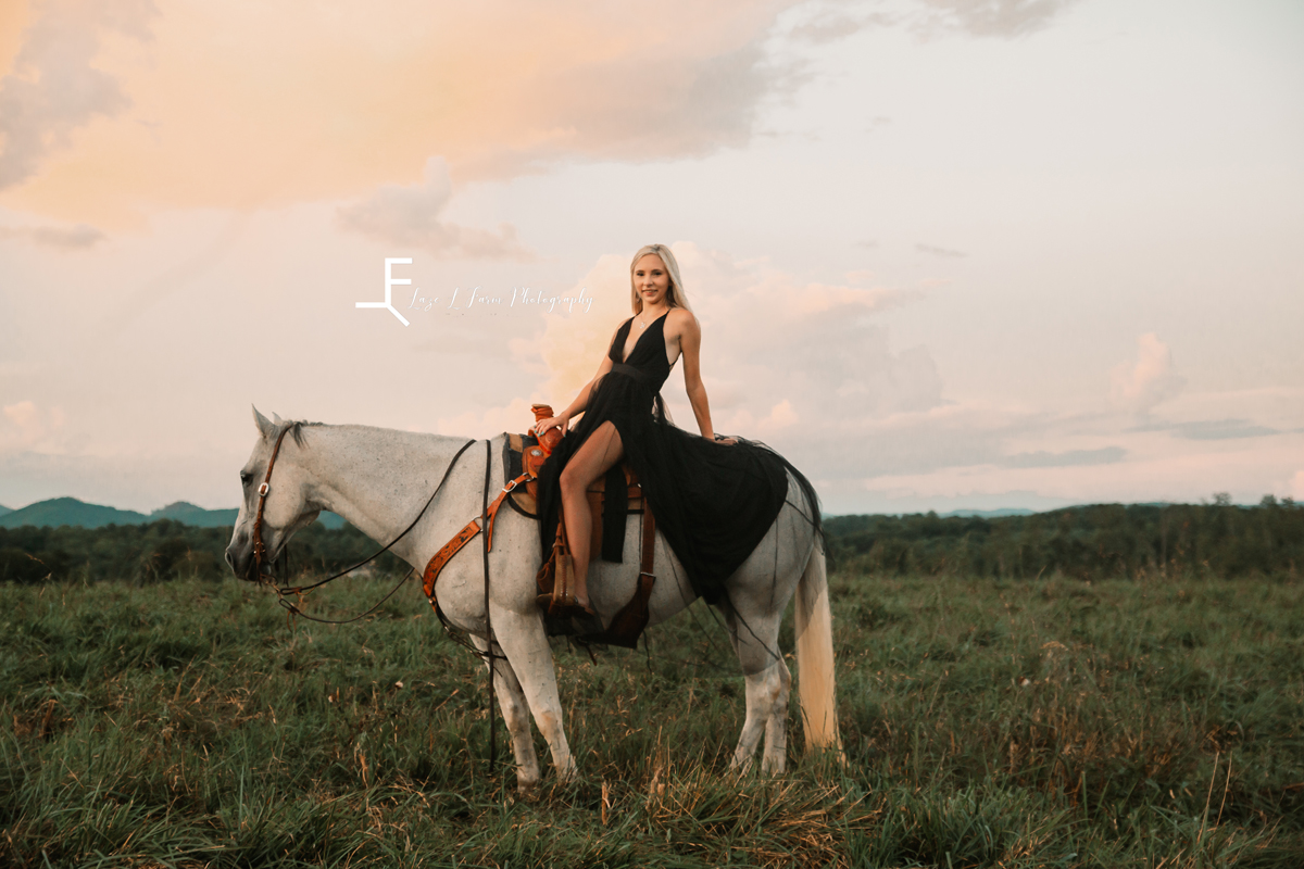Laze L Farm Photography | Cowboy Couple | Taylorsville NC | woman posing on horse