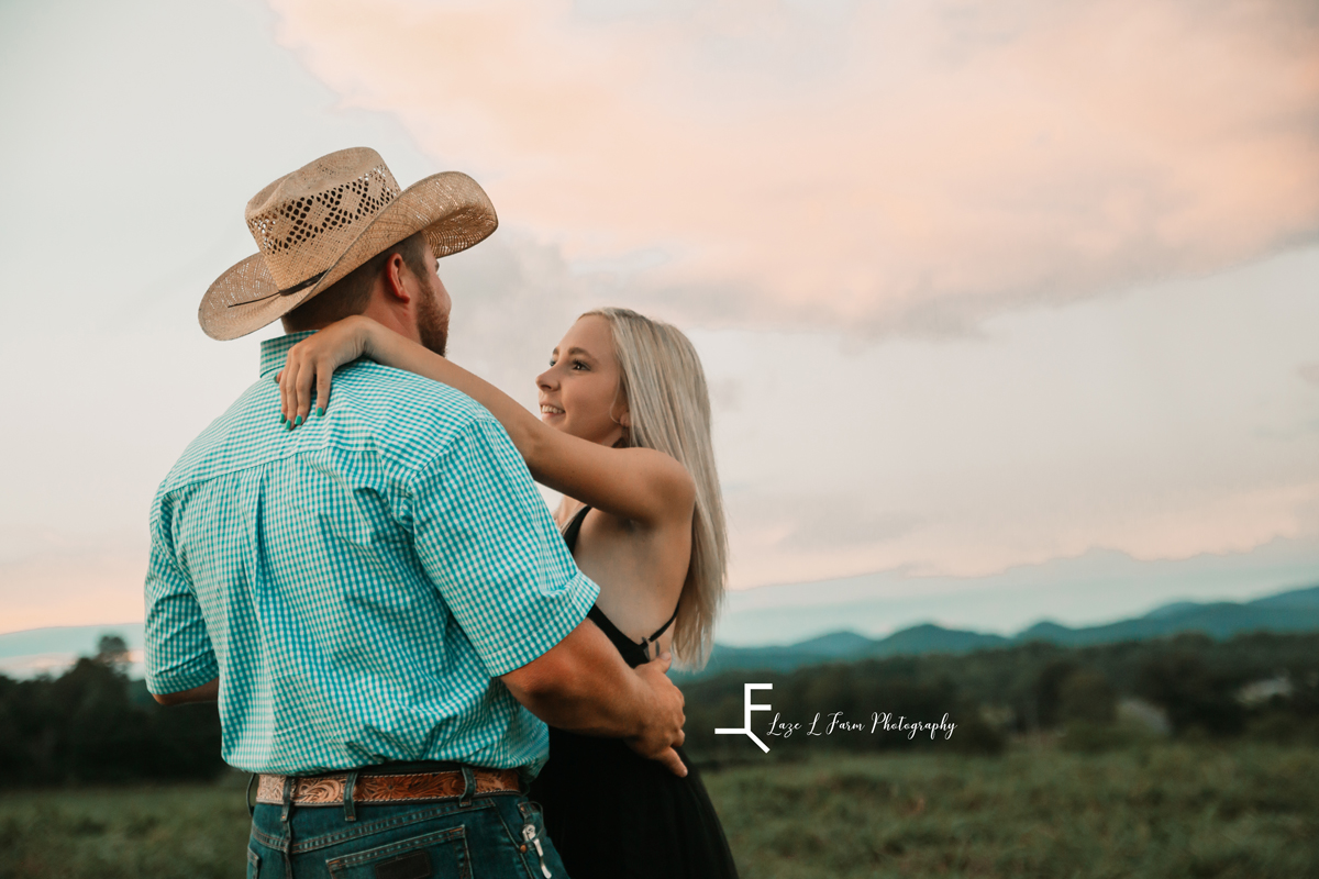 Laze L Farm Photography | Cowboy Couple | Taylorsville NC | couple dancing with a landscape background