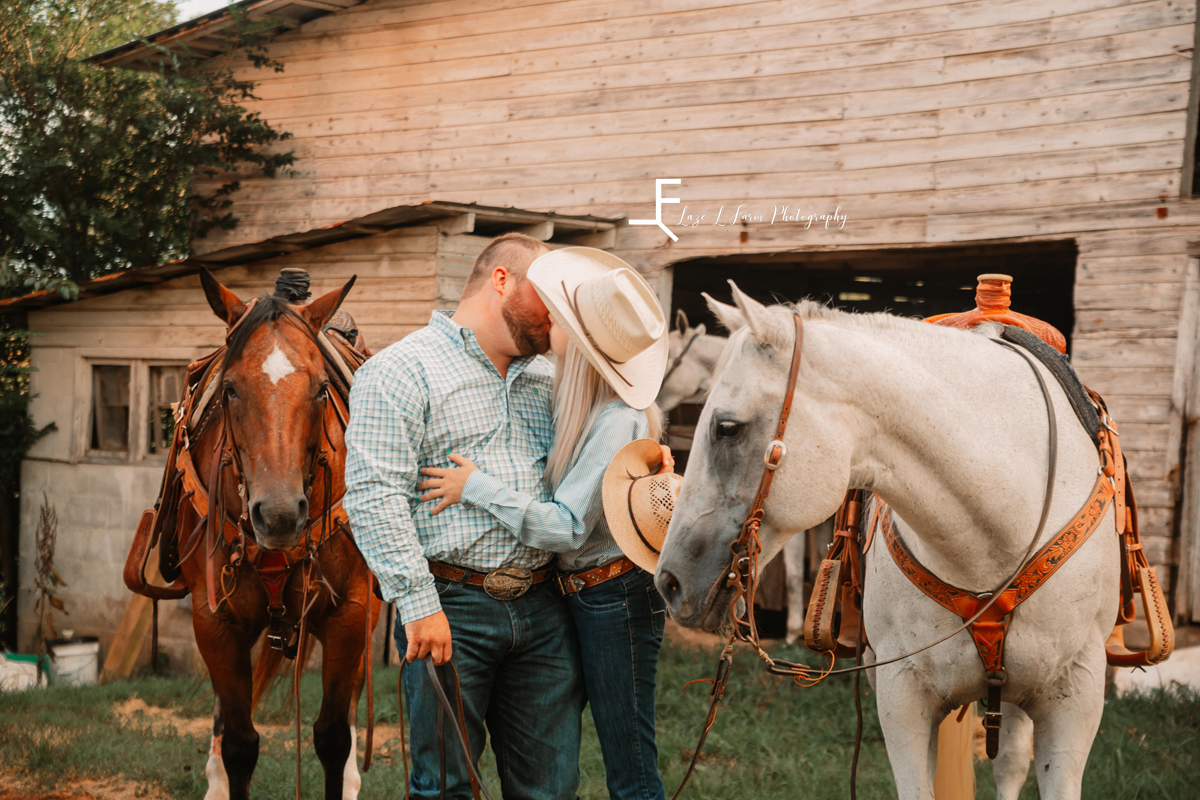 Laze L Farm Photography | Cowboy Couple | Taylorsville NC | happy couple with horses