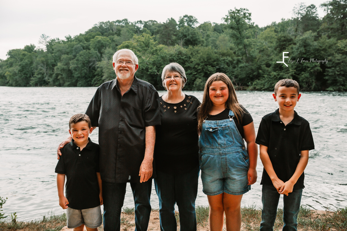 Great- Grandparents with Great-Grandkids on river bank