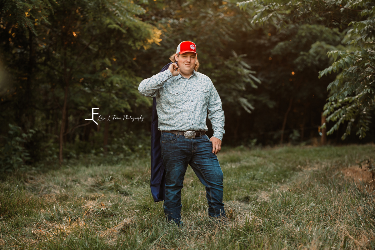 Senior guy with gown and red hat