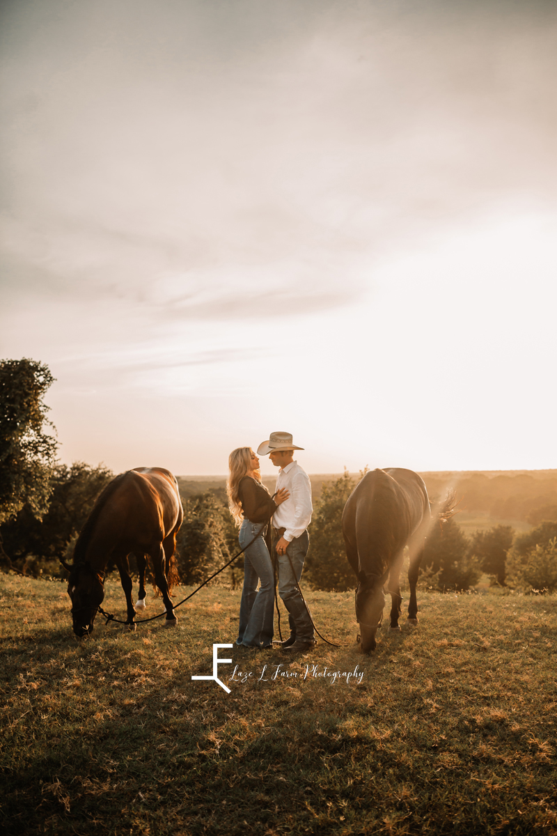 cowboy and wife with 2 horses