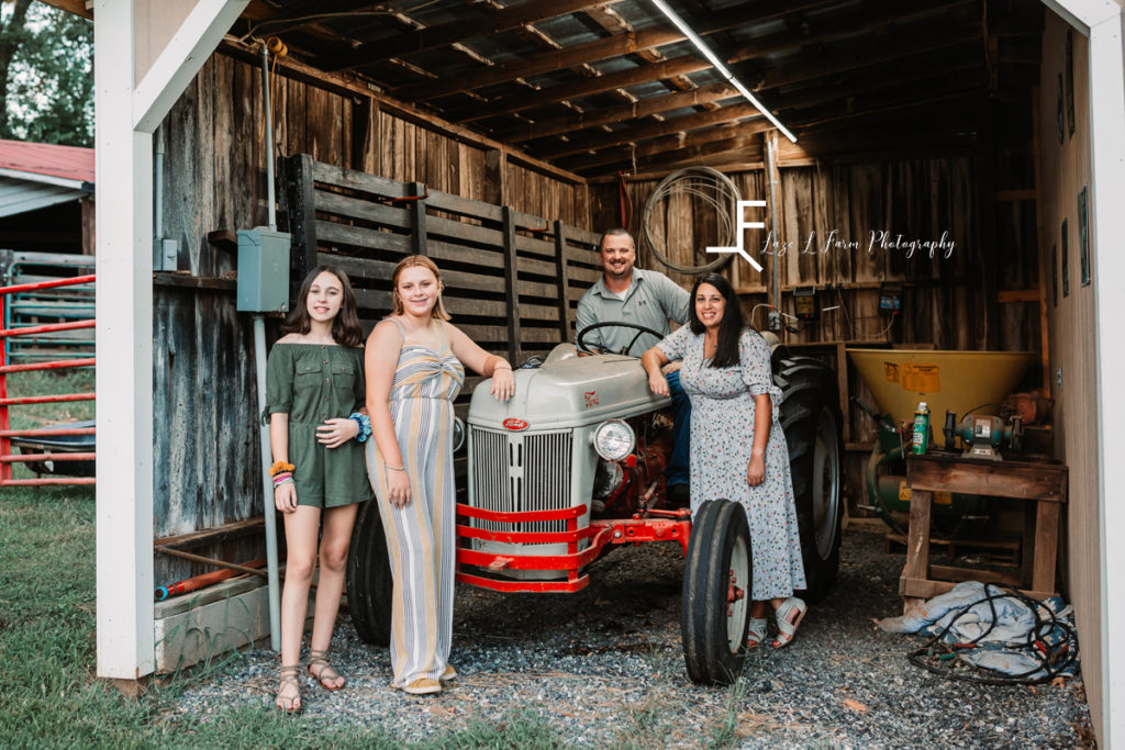 family with old tractor