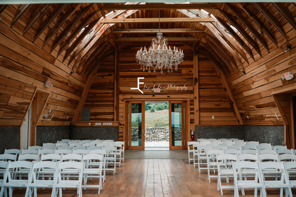 ceremony space barn with chandelier