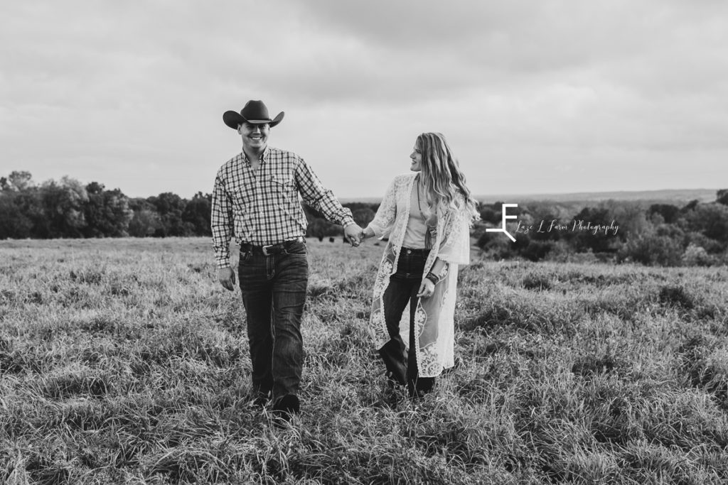 cowboy with wife in black and white