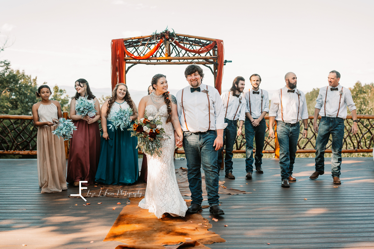 full bridal party walking