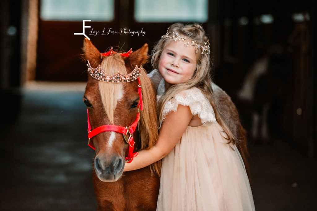 princess with pony wearing crown