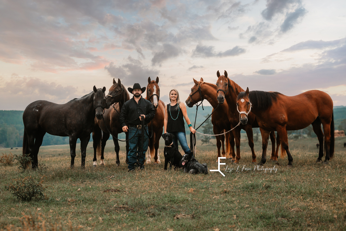 western couple with 6 horses and 2 dogs