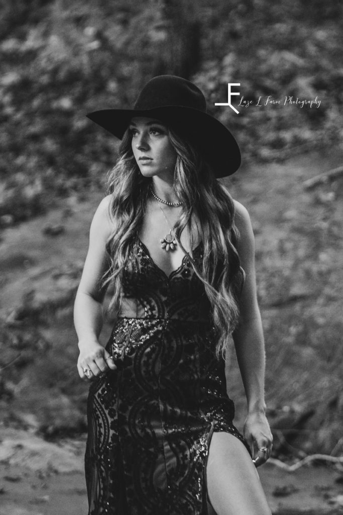 cowgirl in formal dress in black and white