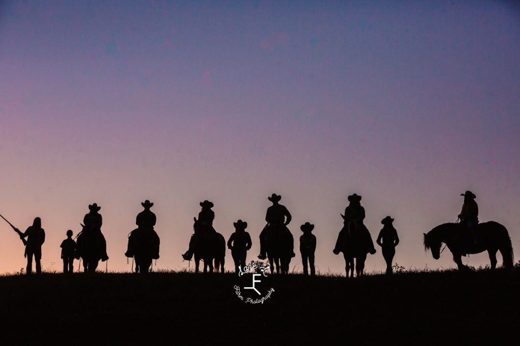 multiple cowboys and cowgirls silhouette