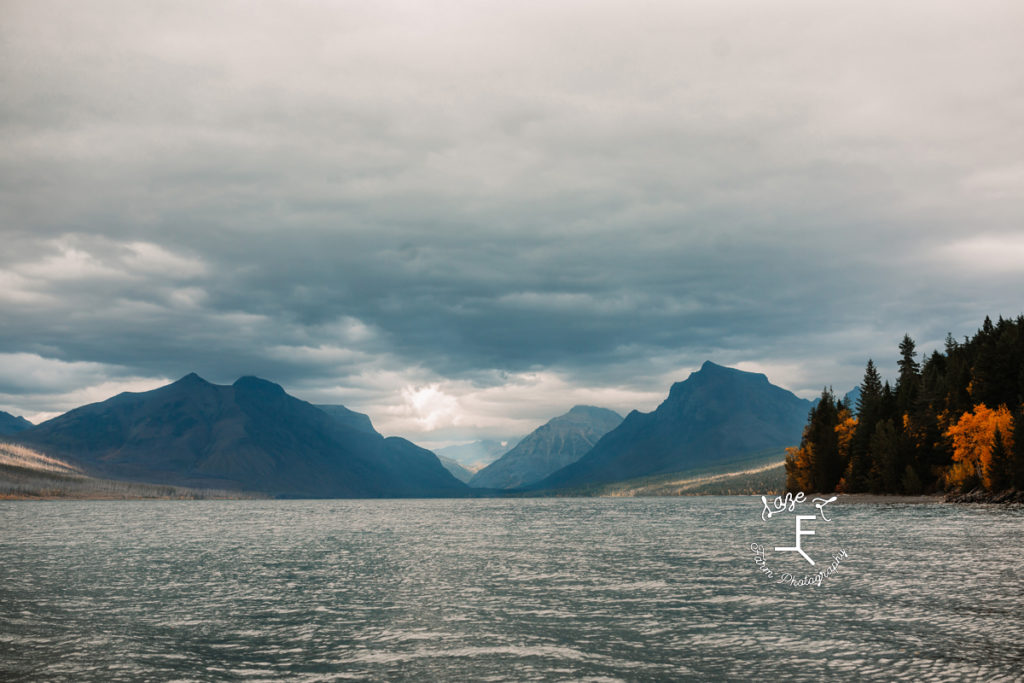 lake with mountains in the back