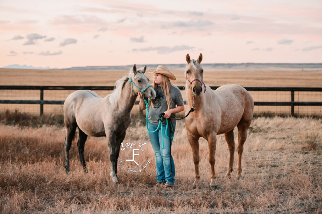 blonde cowgirl with palomino mom and yearling