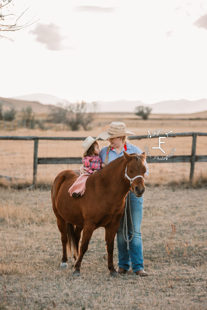 little cowgirl on pony with mom