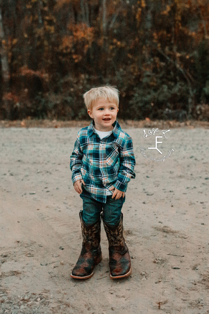 baby boy wearing big brothers boots