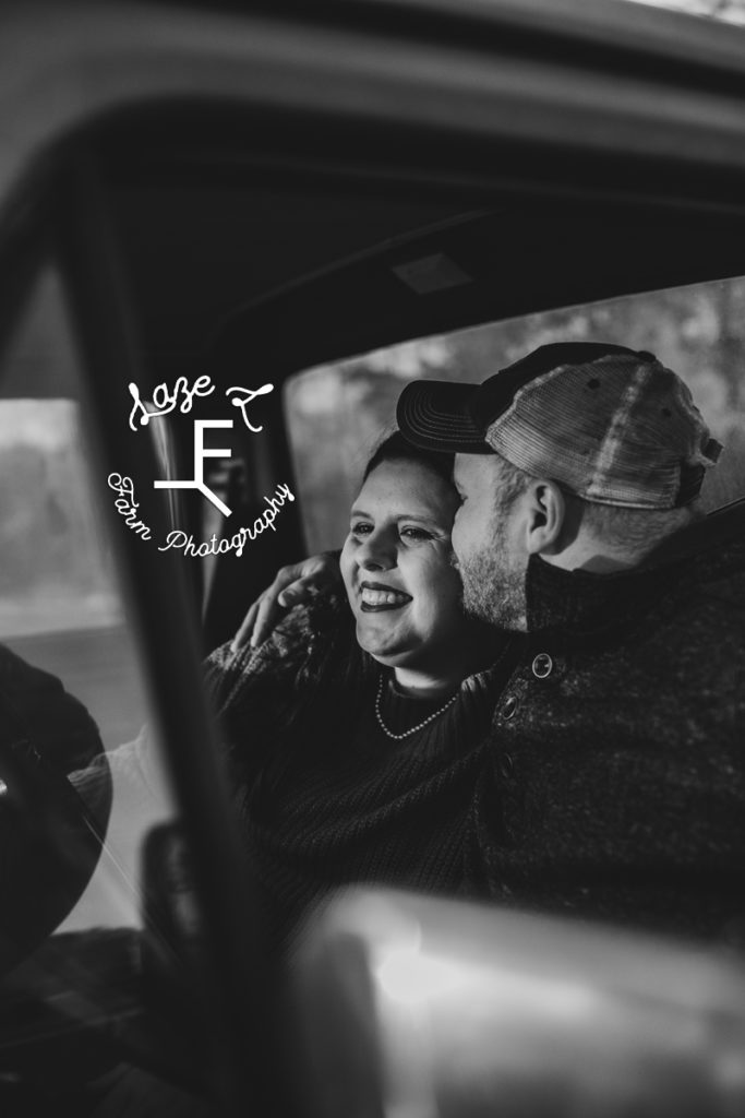couple in black and white in truck