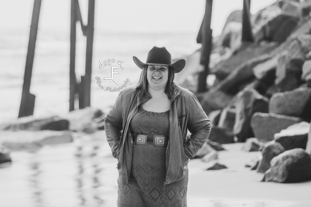 cowgirl on the beach in black and white