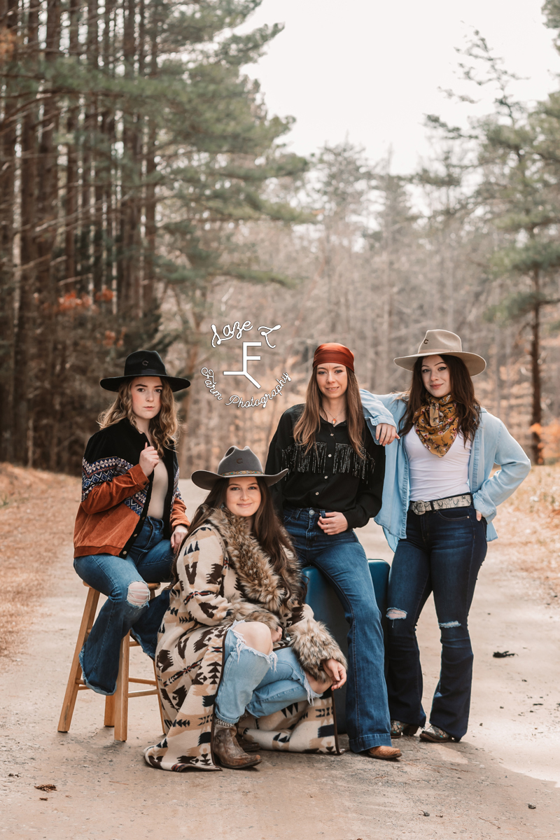 cowgirls on dirt road