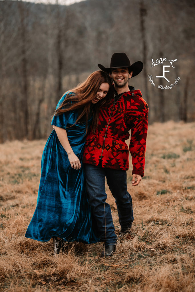 cowboy with girl in blue dress