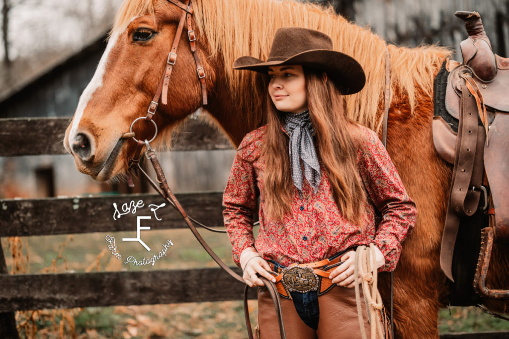 cowgirl with horse looking left