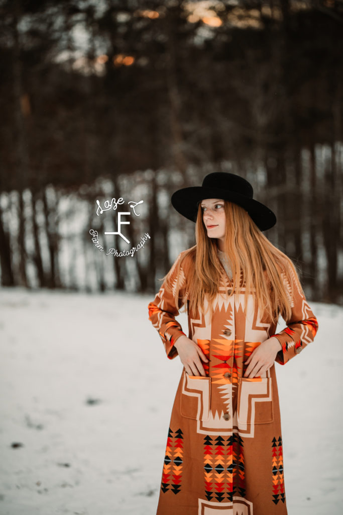 redhead in orange/tan Pendleton print jacket