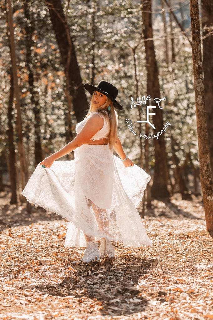cowgirl in white dress spinning