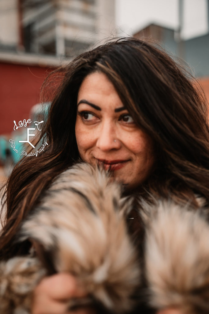 brunette in fur coat close up