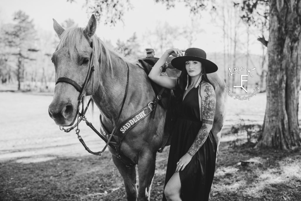 tattooed cowgirl in black and white