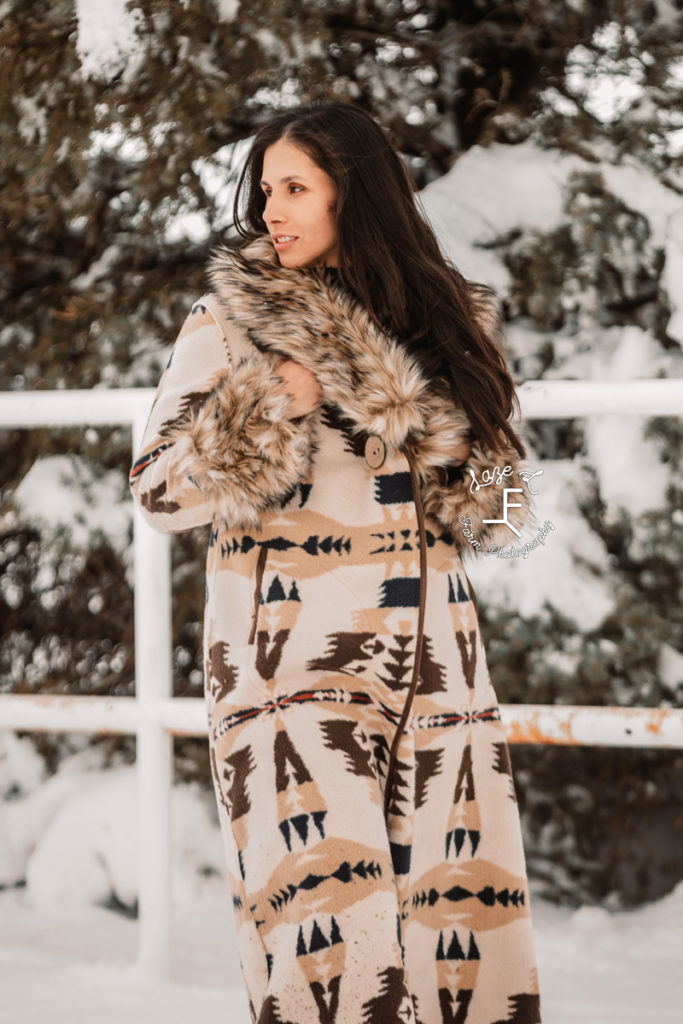 girl in aztec print fur trimmed coat