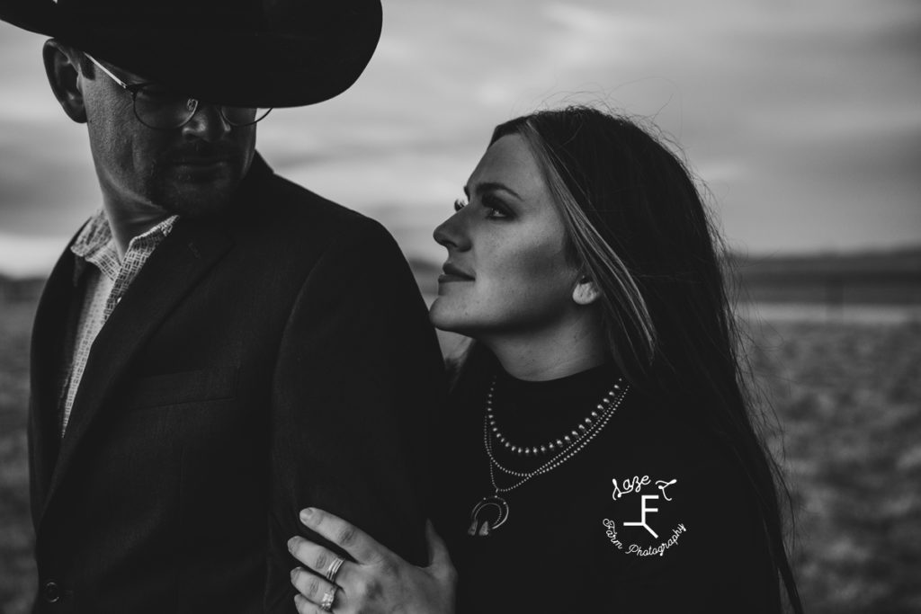 western couple looking at each other in black and white