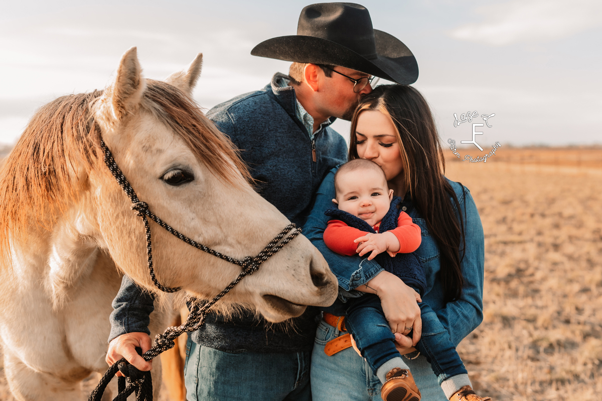 western couple with horse and baby boy