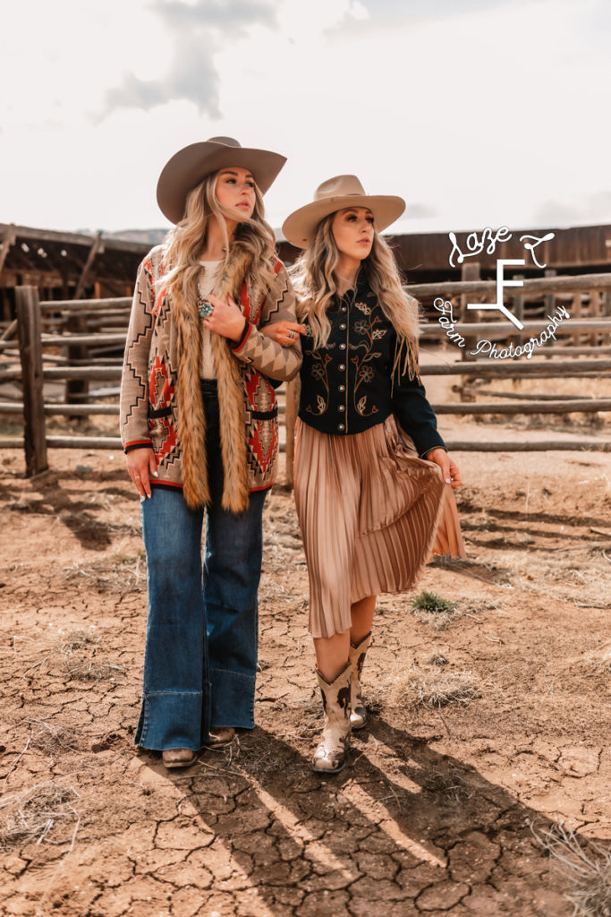 2 blonde cowgirls in western fashion walking