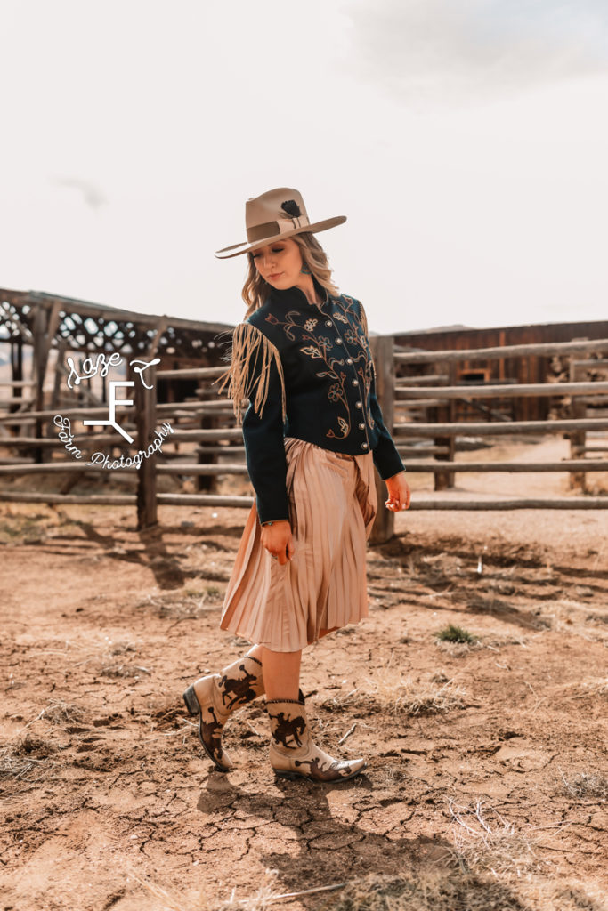 blonde cowgirl in western fashion dress