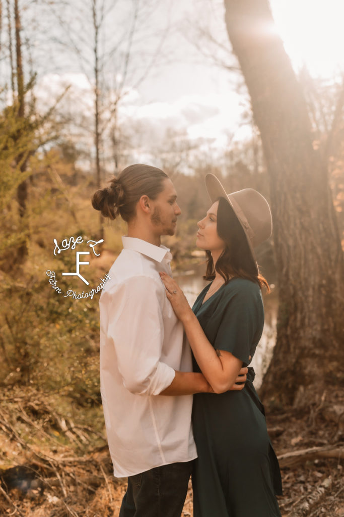 engaged couple looking at each other