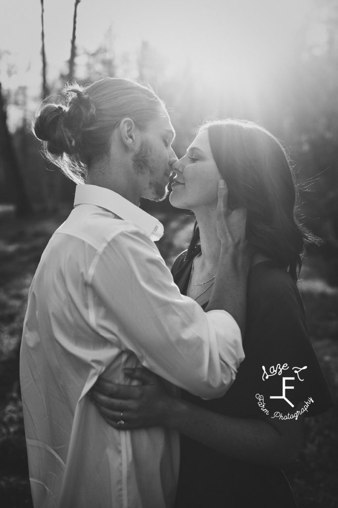 couple about to kiss in black and white