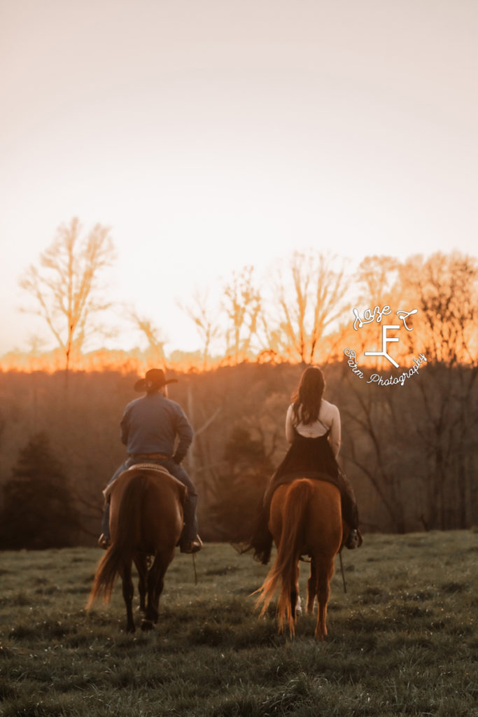 cowboy and wife riding into the sunset